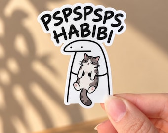 May include: A die-cut vinyl sticker featuring a cartoon character holding a grey and white tabby cat. The text PSPSPSPS, HABIBI is printed in bold black letters at the top. The character has a simple white head and body with black outlines.