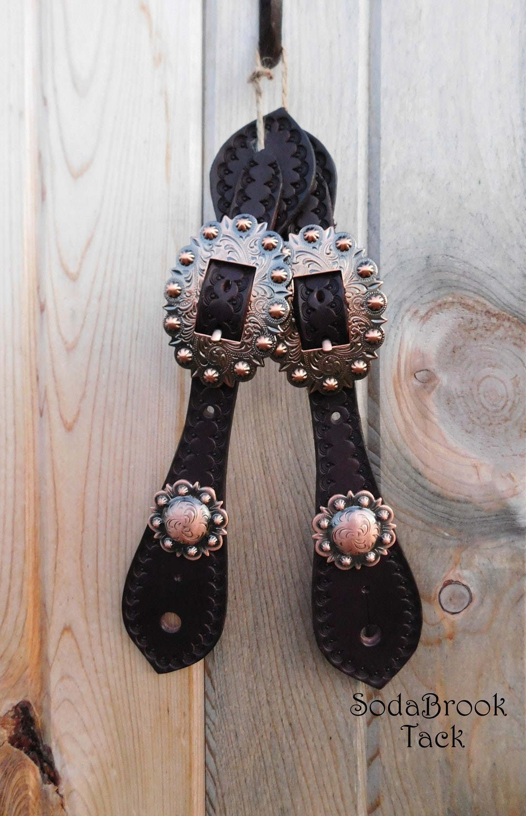 Spur strap with copper hardware.