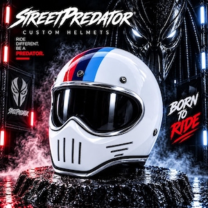 Op de afbeelding: Een witte integraalhelm voor motorrijders met een centrale rode en blauwe racestreep, een donker getint vizier en een kinstuk met verticale ventilatieopeningen. De helm toont de tekst StreetPredator Custom Helmets, Ride Different. Be A Predator.