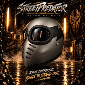 May include: A matte silver full-face helmet with a dark visor, black trim, and a jagged black graphic on the side. The helmet features ventilation slits on the front. Text on the image reads STREETPREDATOR CUSTOM HELMETS and RIDE DIFFERENT. BUILT TO STAND OUT.