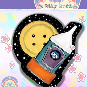 May include: A colourful illustration featuring a yellow button with black dots, set against a black space background with white stars. A rocket ship with a cartoon character is also present. The text "Yu May Dream" is displayed.