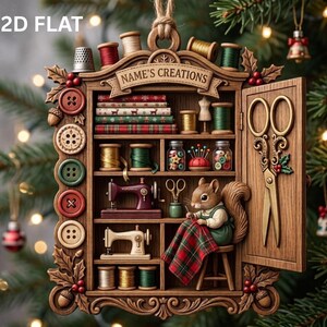 May include: A wooden craft-themed Christmas ornament featuring a cabinet with shelves holding spools of thread, fabric bolts, sewing machines, and a squirrel sewing a plaid quilt. The cabinet door displays gold scissors and the text NAME'S CREATIONS.