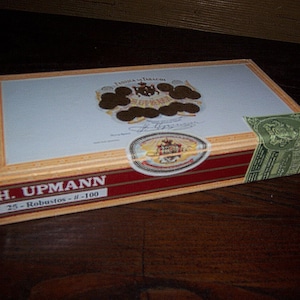 Pair of paper wrapped wooden cigar boxes