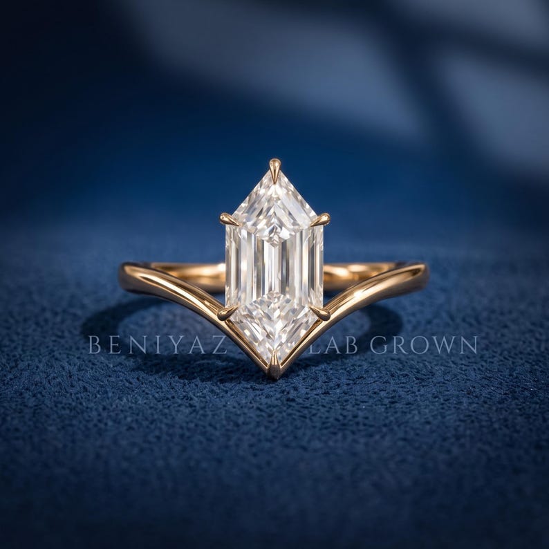 Front angled view of a Dutch Marquise lab grown diamond solitaire ring showing the geometric center stone and yellow gold setting.