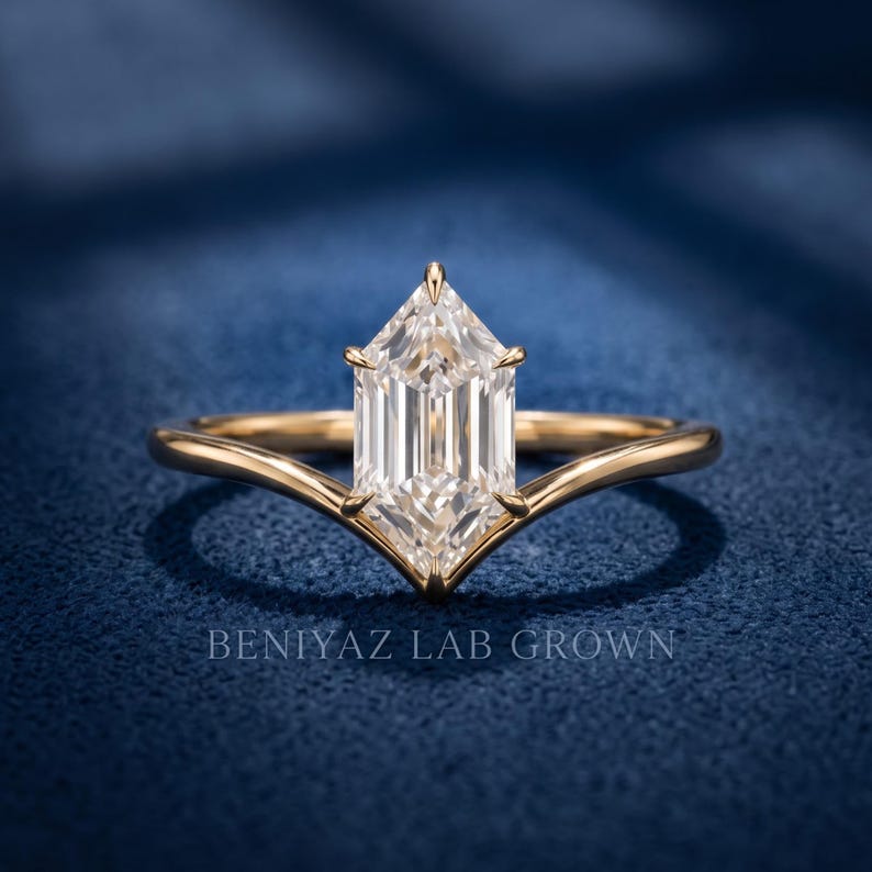 Dutch Marquise cut lab grown diamond engagement ring in yellow gold with a minimalist V-shaped chevron solitaire shank.