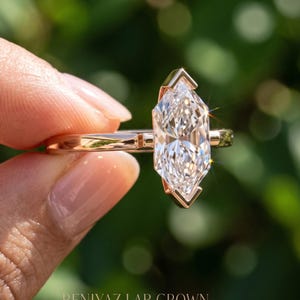 Side angle of Dutch marquise lab grown diamond ring highlighting the V prong setting and minimalist solitaire design.