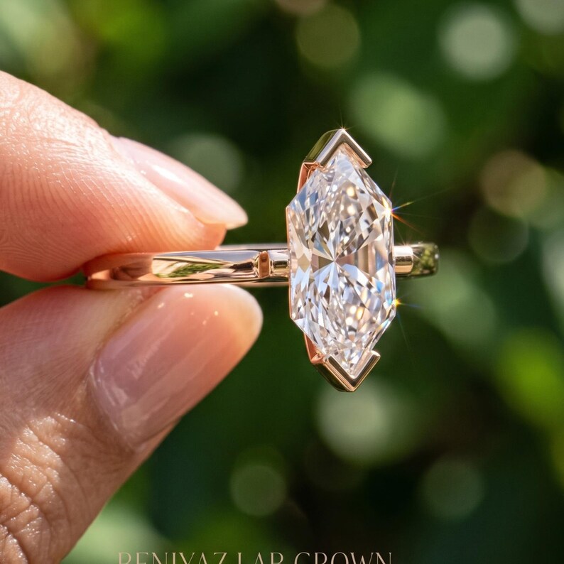 Side angle of Dutch marquise lab grown diamond ring highlighting the V prong setting and minimalist solitaire design.
