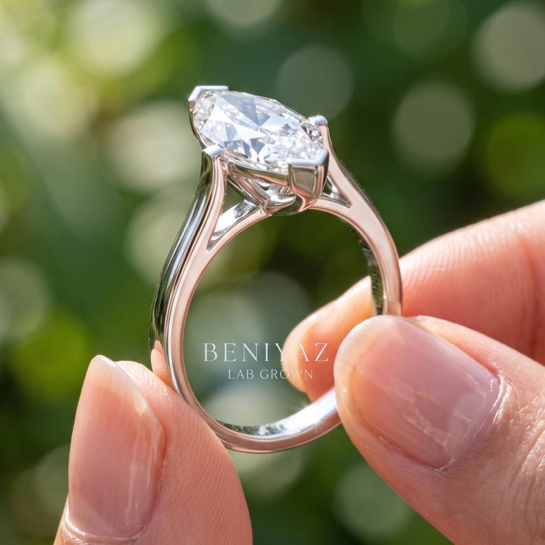 Side view of Dutch marquise solitaire ring in 925 sterling silver, showing center diamond profile and minimalist engagement ring design.