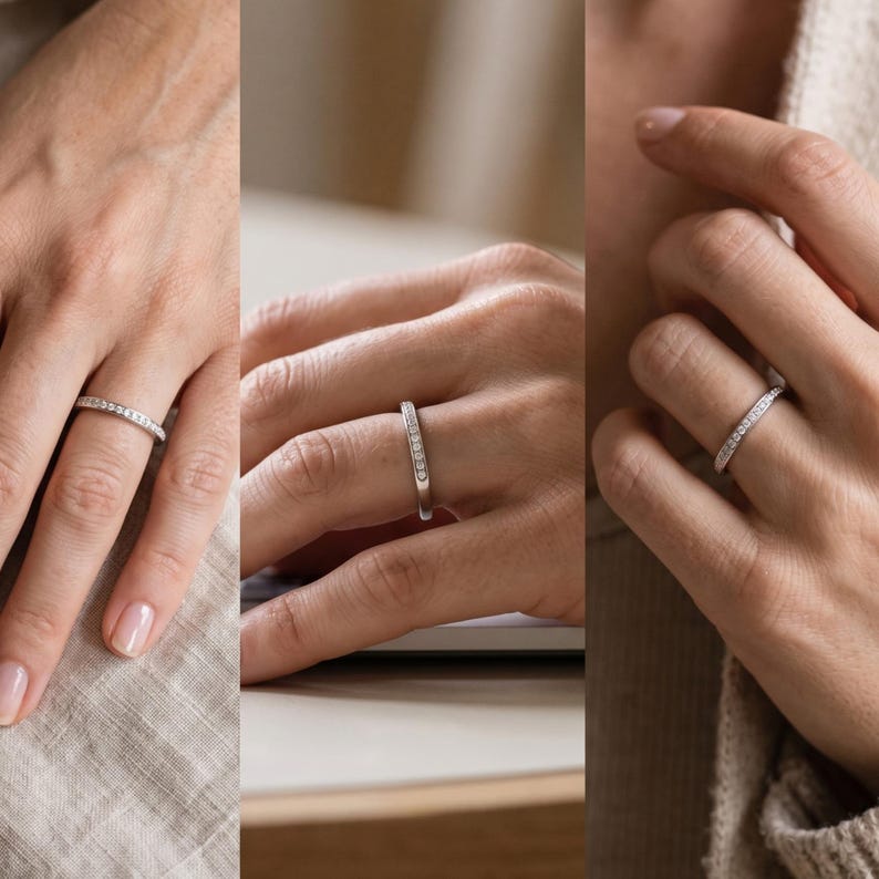 Stackable wedding band worn on hand, showing a slim minimalist 2mm design paired naturally as bridal jewelry.