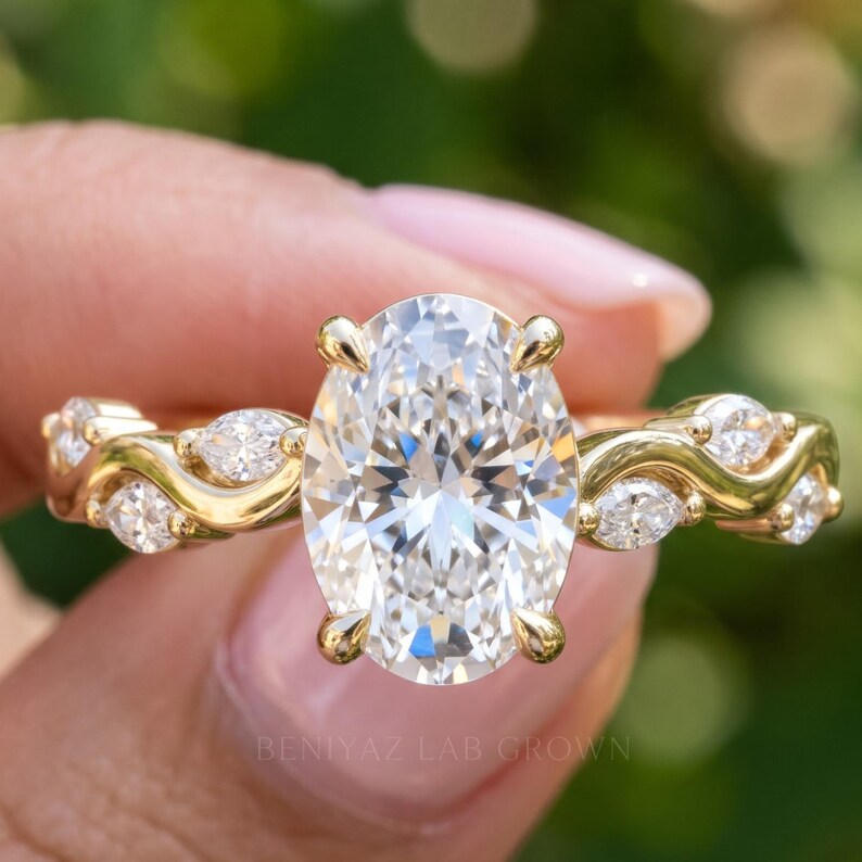Front view of vintage three stone engagement ring with oval lab grown diamond center and elegant side diamond accents.