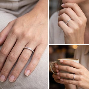 Thin wedding band shown in lifestyle hand views, highlighting the delicate stackable profile and minimalist bridal ring design.