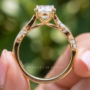 Full back view of oval lab grown diamond ring showing the polished shank, elevated setting and dainty engagement design.