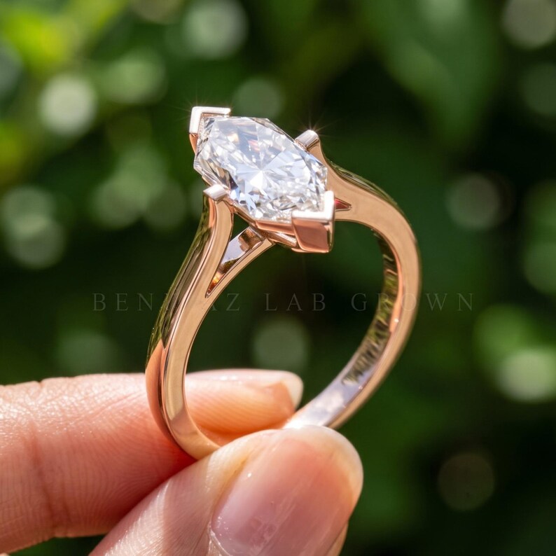 Side profile of Dutch marquise engagement ring showing the solitaire setting, slim shank and elevated center lab grown diamond.