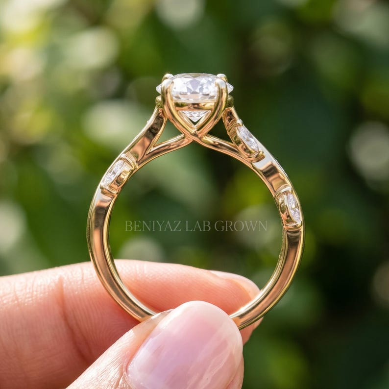 Rear profile of lab grown diamond engagement ring showing the polished circular band and raised oval center setting.
