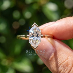 Three quarter profile of Dutch marquise lab grown diamond engagement ring showing the center stone height and slim shank.