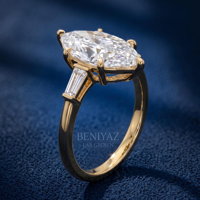Side angle studio view of Dutch marquise lab grown diamond ring showing raised prong setting, gallery and polished shank