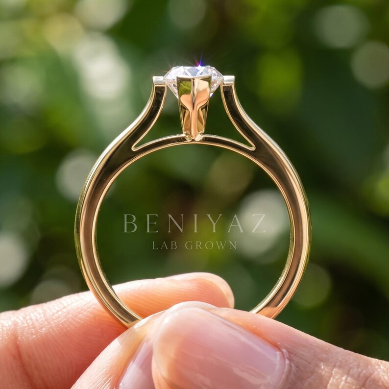 Back profile of Dutch marquise lab grown diamond ring showing the polished shank, solitaire basket and V prong setting.