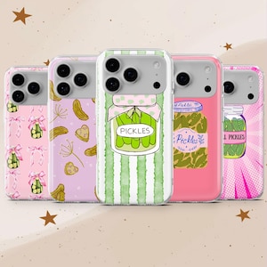 May include: Five clear phone cases featuring pickle-themed designs. The first has pink bows and jars, the second has pickle slices and dill, the third has a large jar labelled PICKLES on green stripes, the fourth has a jar labelled Pickles, and the fifth has a jar labelled ALL PICKLES.