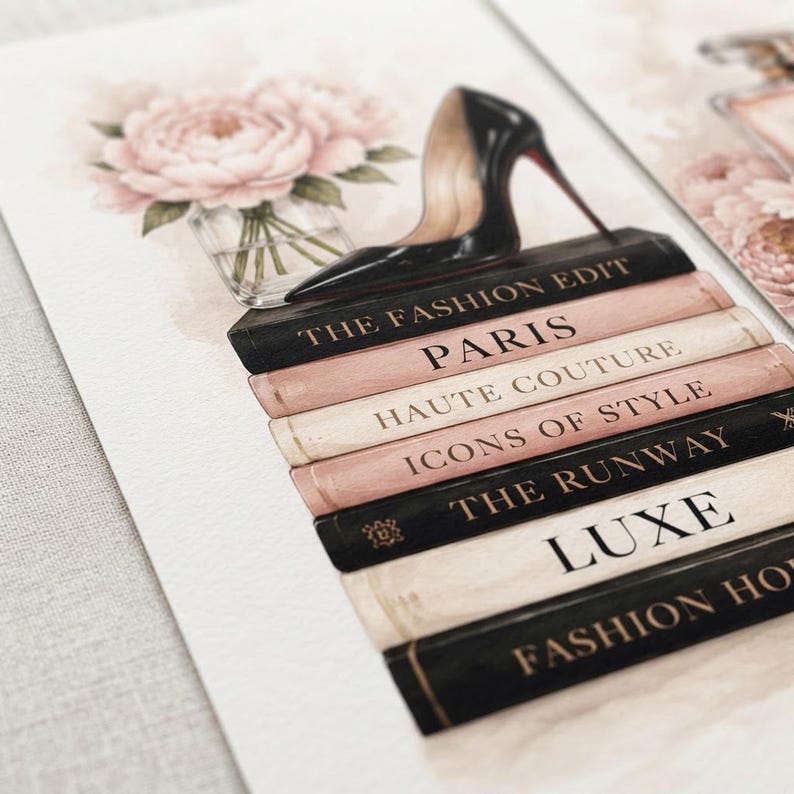 Close-up detail of the high heel and fashion books watercolor print showing fine paper texture and soft pink tones.