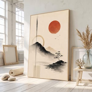 May include: A vertical rectangular wall art print featuring a minimalist landscape with a large red sun, black ink-wash mountains, a small tree on a rocky outcrop, a golden circular ring, and a thin vertical black line with a rectangular grid base.