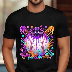 May include: A black t-shirt featuring a graphic of a white baseball crossed with two baseball bats. A black spider sits on top of the ball, which is covered in dripping purple, orange, and blue paint, colorful sprinkles, and small candy shapes.