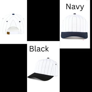 May include: White baseball cap with navy blue pinstripes and a navy blue brim. The cap has a curved brim and a button on top. The word "Navy" is written in white text on the image. The word "Black" is written in white text on the image.