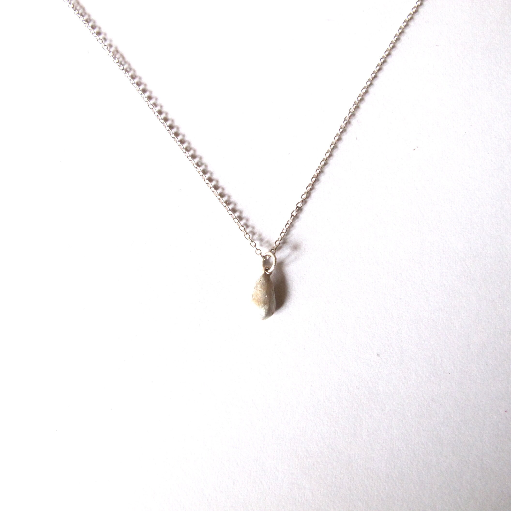 Tiny silver appleseed pendant necklace apple seed pendant Etsy