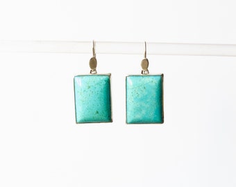 Turquoise earrings set in silver made by hand