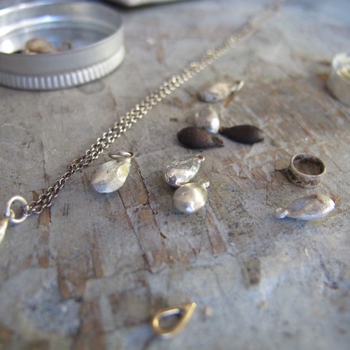 Tiny silver appleseed pendant necklace apple seed pendant Etsy