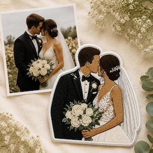 May include: A custom embroidered patch depicting a couple in wedding attire, featuring a person in a black tuxedo and a person in a white lace gown holding a bouquet of white roses. The patch mirrors a photograph of the couple kissing in a field.