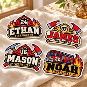 May include: Four embroidered patches featuring firefighter themes. One shows a red helmet with number 24 and the name ETHAN. Another shows a yellow helmet with number 07 and JAMES. A third shows a red helmet with number 16 and MASON. The last shows a fire truck with number 32 and NOAH.
