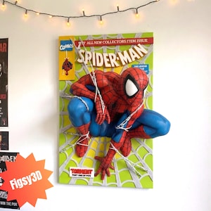 May include: A three-dimensional wall art piece featuring Spider-Man in a crouching pose on a comic book cover background. The red and blue character is positioned over a lime green web pattern. Text includes Marvel Comics, Spider-Man, and Torment.