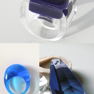 May include: Two resin rings, one clear with a dark blue inset, and one solid blue. The rings are shown next to a silicone mold of a blue crystal pendant.
