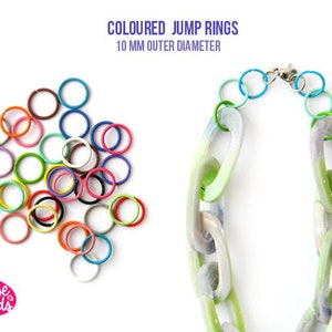 May include: Assortment of colourful 10 mm jump rings, ideal for jewellery making. The rings are in various colours, including red, orange, yellow, green, blue, purple, and pink.  The image also shows a necklace made with the jump rings.