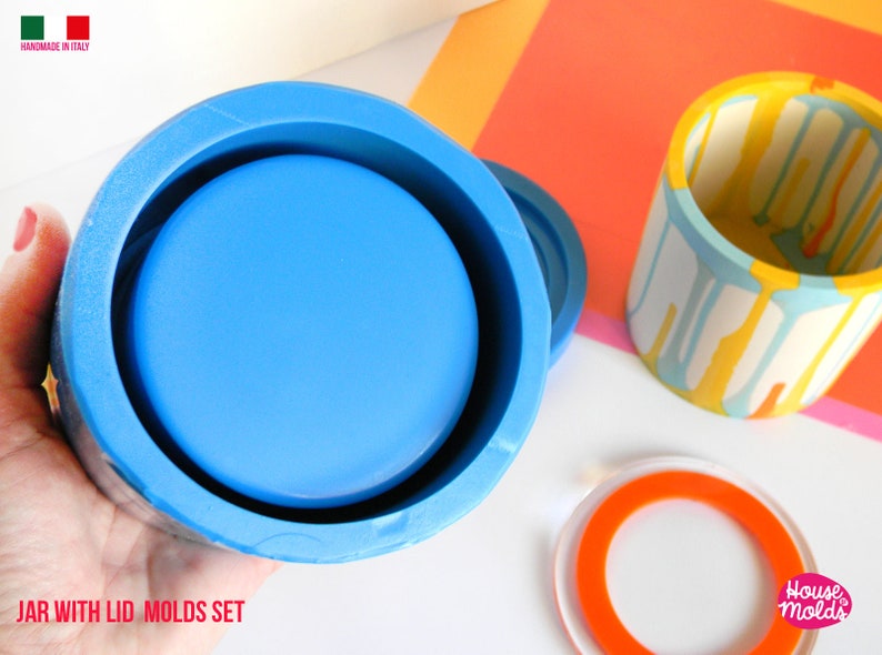 May include: A set of two silicone moulds for making a jar with a lid. The mould is blue and the lid mould is orange. The text "JAR WITH LID MOLDS SET" is visible at the bottom of the image.