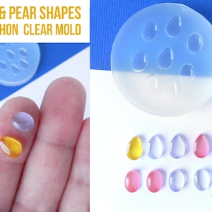 May include: Clear silicone mold with eight cavities for making oval and pear-shaped cabochons. The mold is shown with finished cabochons in various colors, including yellow, pink, and clear.