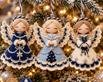 May include: Three crocheted angel ornaments with blonde hair, each wearing a dress in shades of navy blue, light blue, or cream. The figures feature intricate lace-like wings, silver bead accents, and braided hanging loops for display.