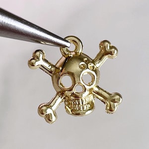 Gold Toned Skull and Crossbones Charm: Halloween Jewelry Findings (4 pcs)