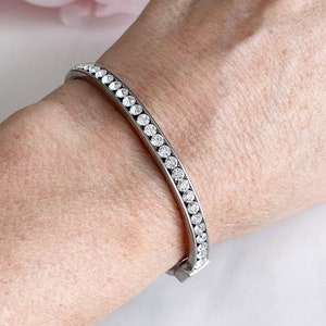 Vintage 1970s Rhinestone Cuff Bracelet: Silver Toned CZ Bangle