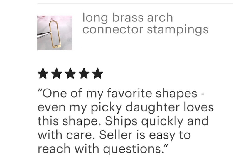 May include: A close-up of a gold-colored metal arch connector stamping. The connector is long and narrow, with a rounded top and bottom. The image includes a five-star rating and a customer review that reads: "One of my favorite shapes - even my picky daughter loves this shape. Ships quickly and with care. Seller is easy to reach with questions."