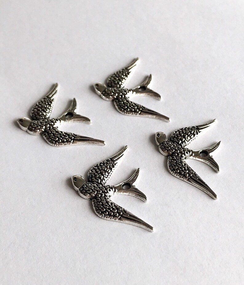 4 pcs silver bird charms x 4 swallow charms flying birds soaring birds silver wings 25 mm birds jewelry supplies