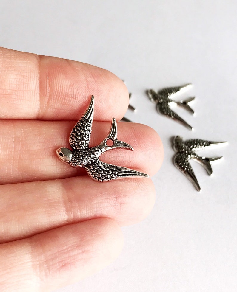 4 pcs silver bird charms x 4 swallow charms flying birds soaring birds silver wings 25 mm birds jewelry supplies
