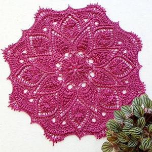 Crochet doily in pink color