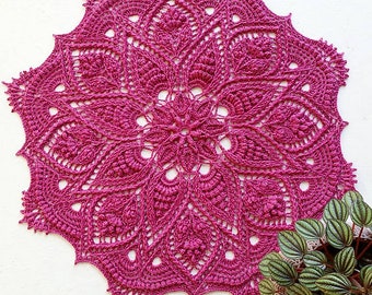 Crochet doily in pink color