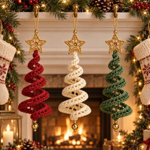 May include: Three hanging Christmas tree ornaments in red, cream, and green. Each spiral-shaped tree is crafted from crochet yarn, topped with a gold-colored crocheted star, and finished with a small gold-toned bead at the bottom point.