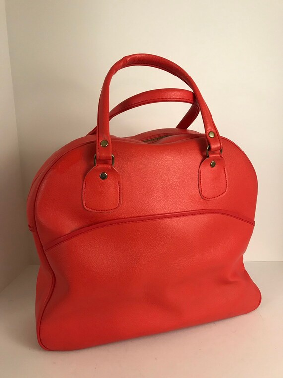 red travel bag