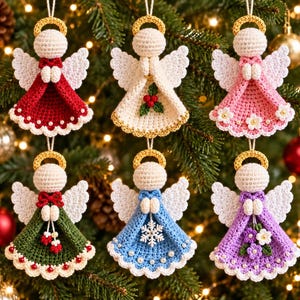 May include: Six crocheted angel ornaments with gold halos and white wings. The angels wear dresses in red, white, pink, green, blue, and purple, each featuring unique embellishments like holly, flowers, pearls, and a snowflake, all hanging by strings.
