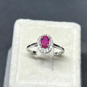 925 Sterling Silver Oval Ruby Glass-Filled Halo Ring, Moissanite Accents (US Size 7.5)