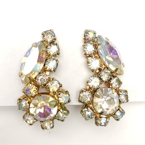 Rhinestone Climbing earrings gold plated metal Mid century Flower clear Aurora borealis crystal clip on earrings