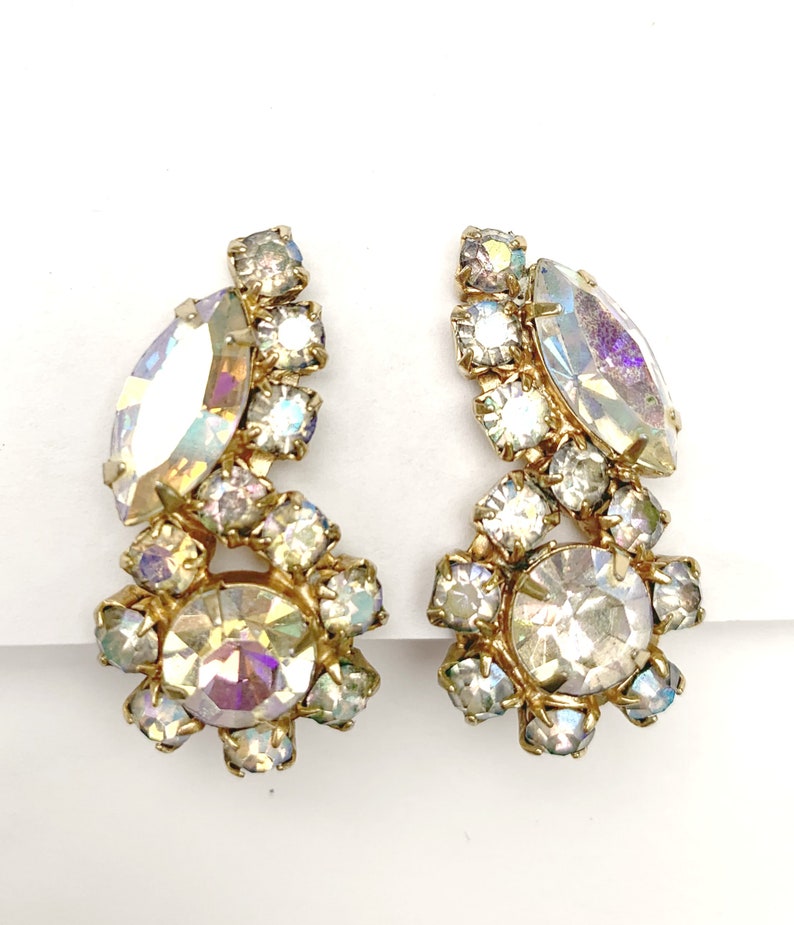 Rhinestone Climbing earrings gold plated metal Mid century Flower clear Aurora borealis crystal clip on earrings